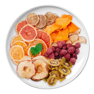 Assorted dried fruits and vegetables on a white plate